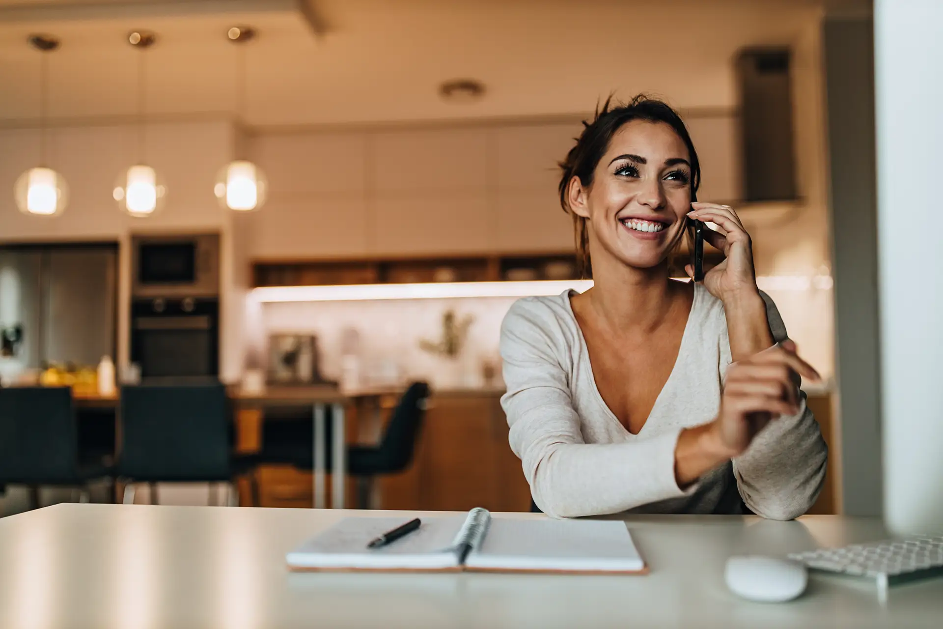 Woman smiling on the phone