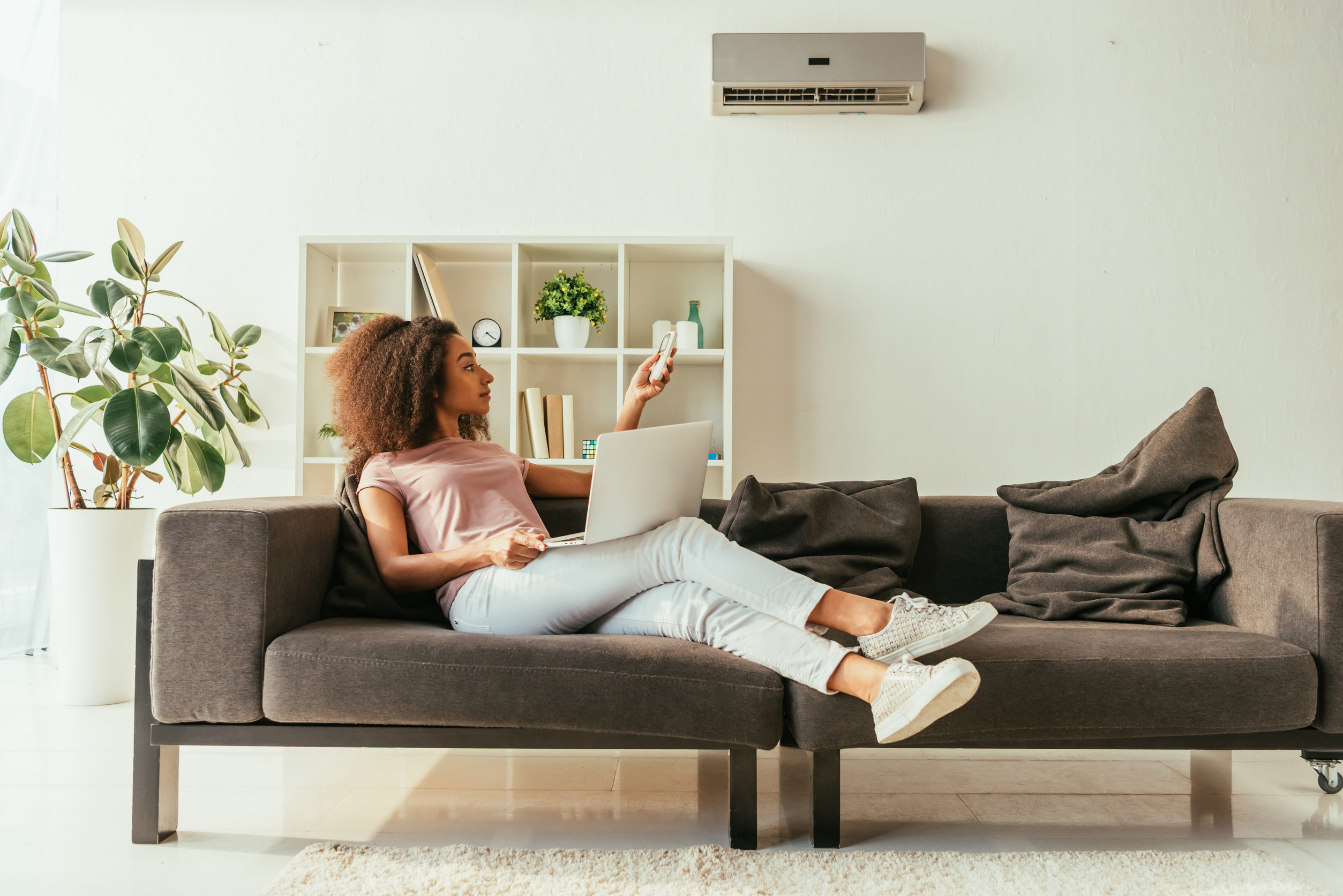 Person enjoying their high-efficiency HVAC system in Roanoke, VA